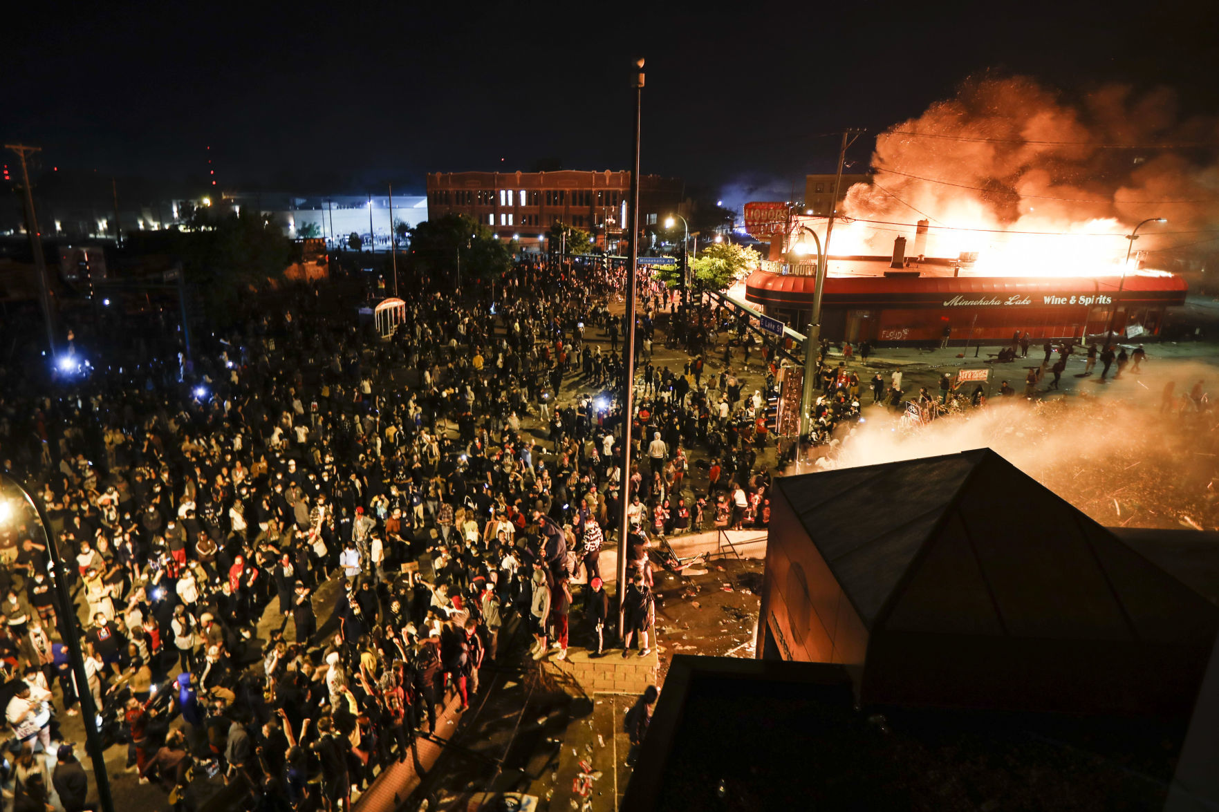 George Floyd protesters set Minneapolis police station afire